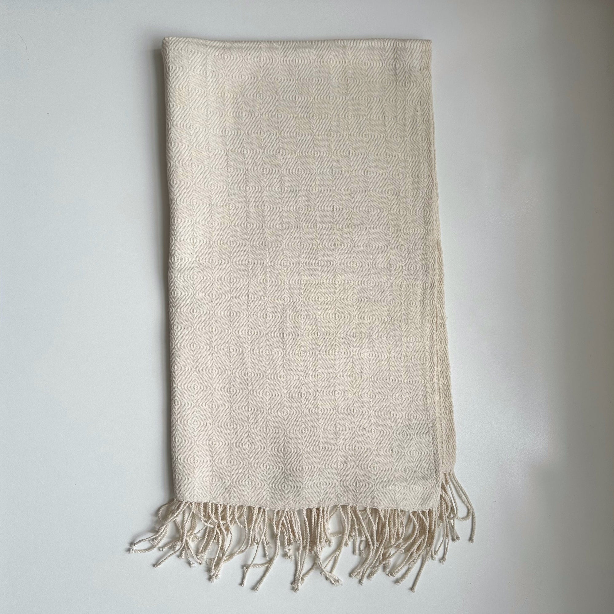 white handwoven hand towel