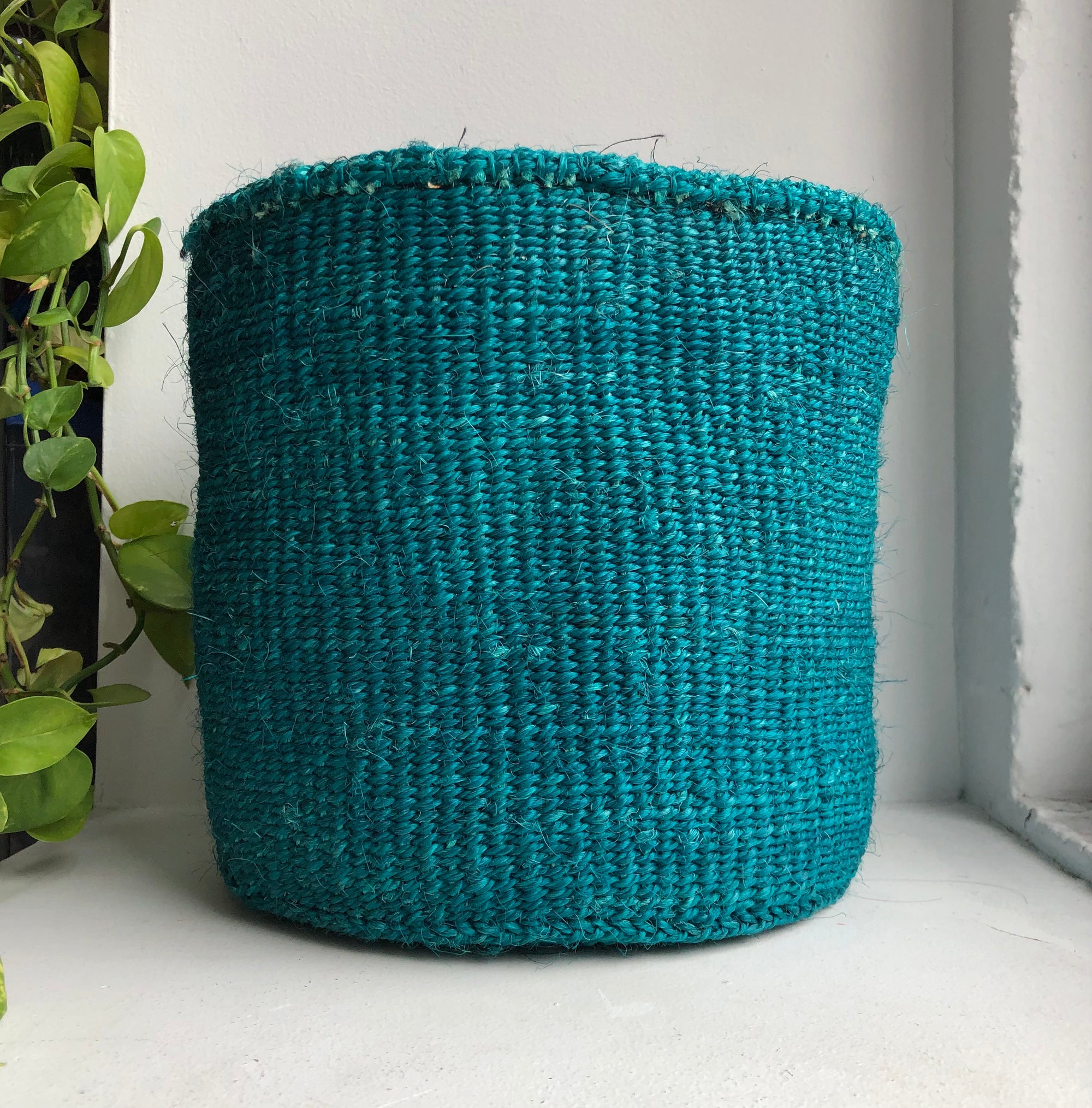 display of 10&quot; teal basket