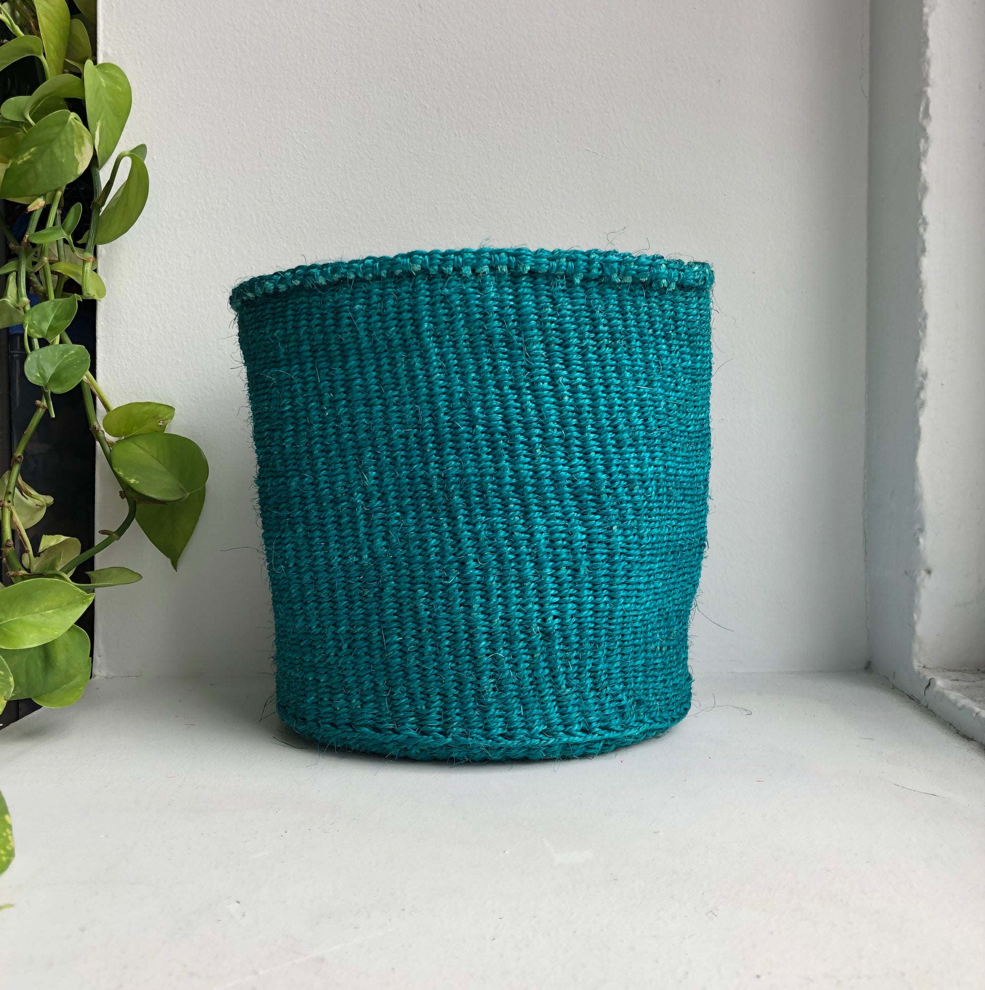 display of 8&quot; teal basket