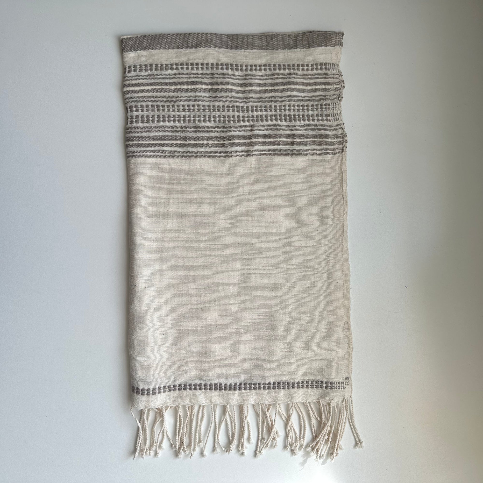 Stone and ivory colored hand spun Ethiopian cotton hand towel