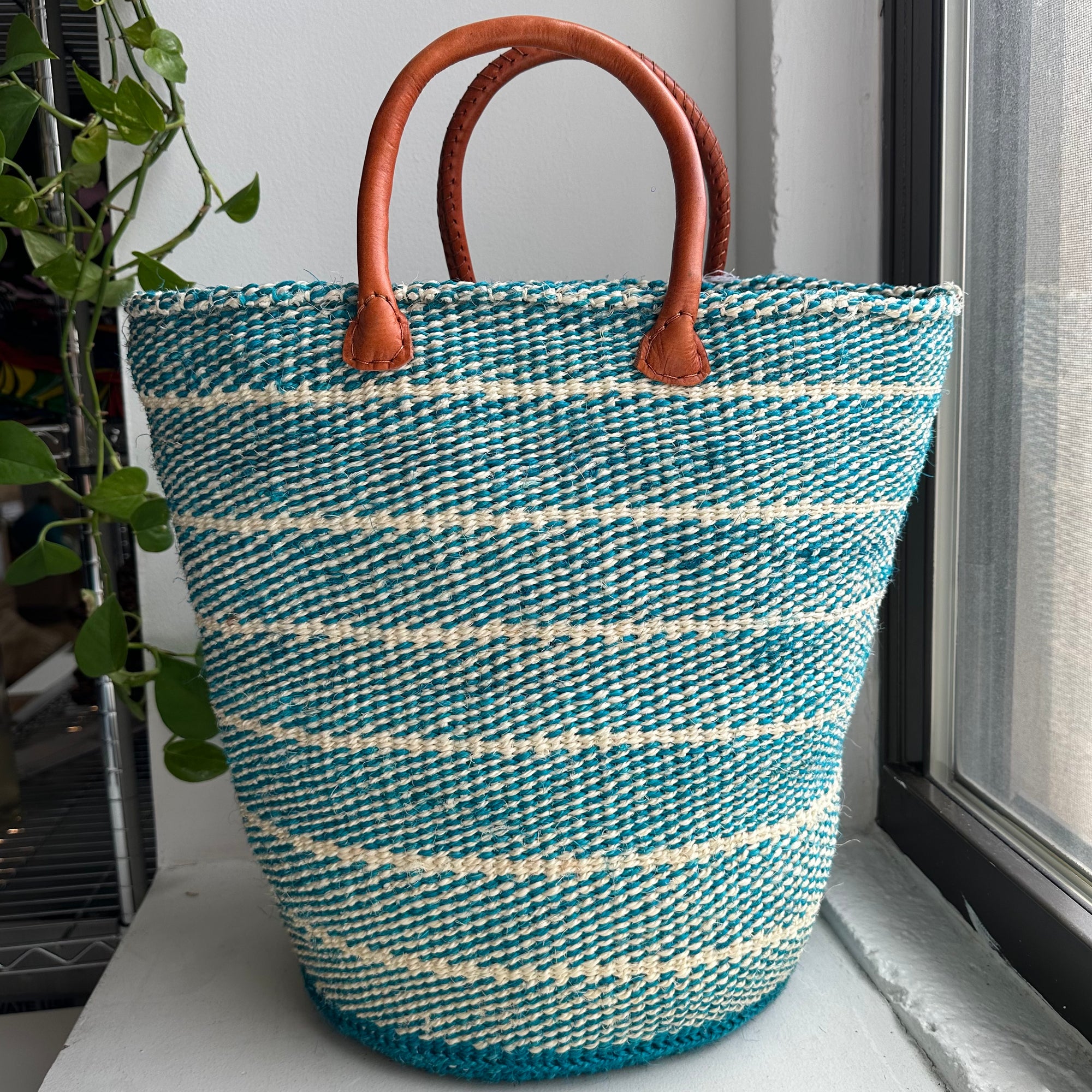 blue woven striped handle basket