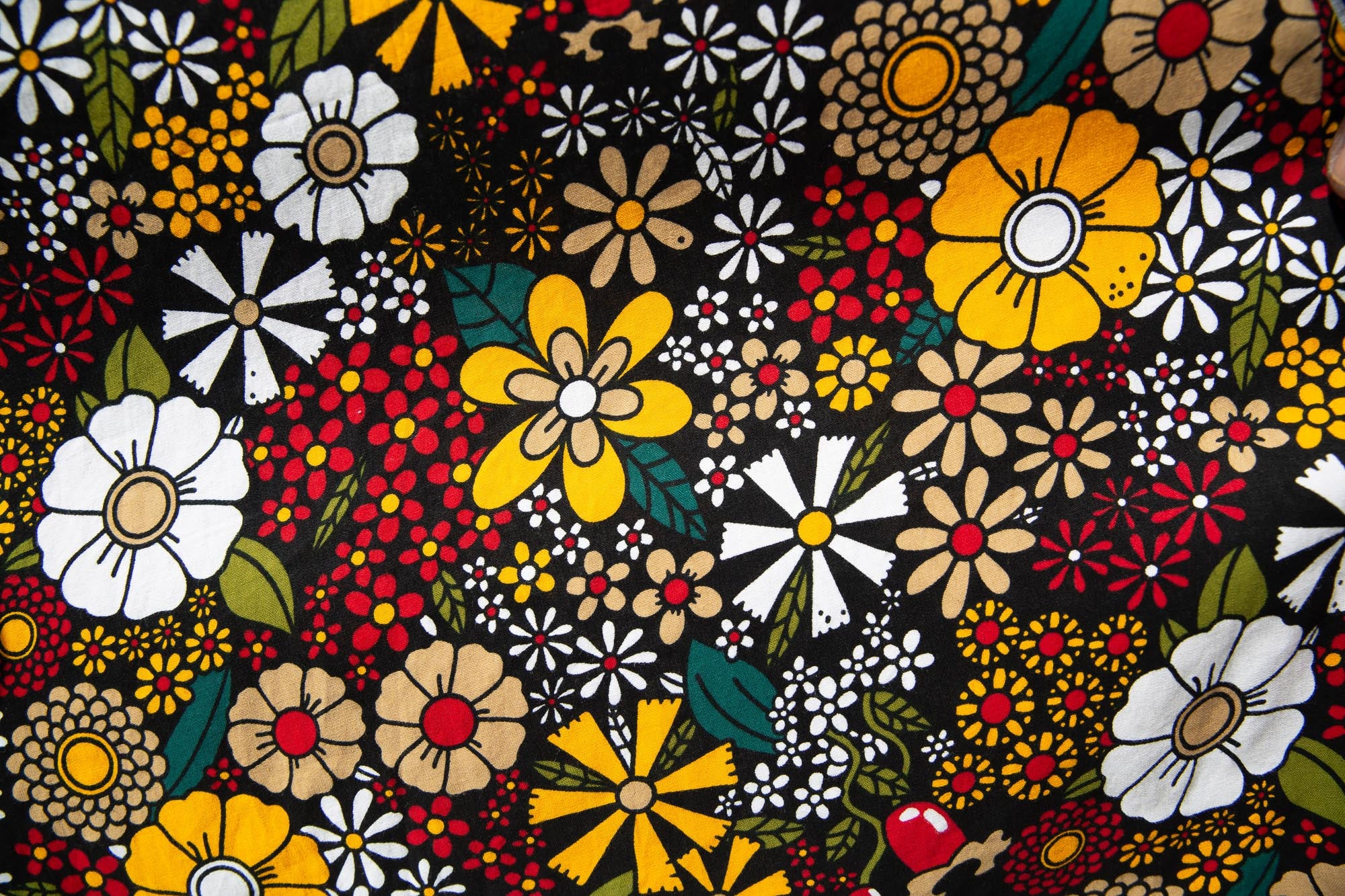 Close up display of colorful flower print dress