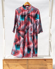 Display of black, red, pink, light blue print dress