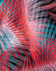 Close up display of black, red, pink, light blue print dress