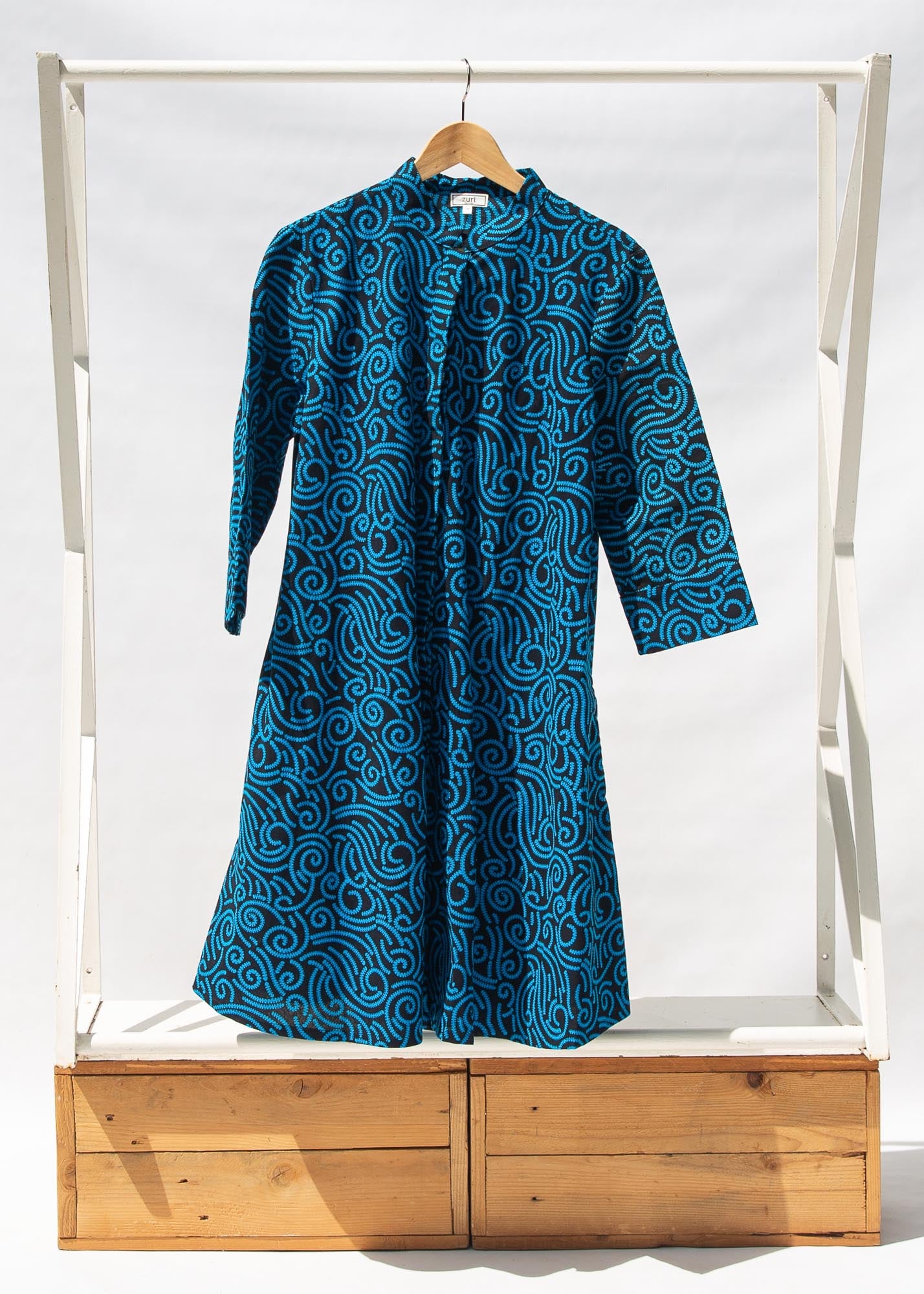 Display of blue and black print dress