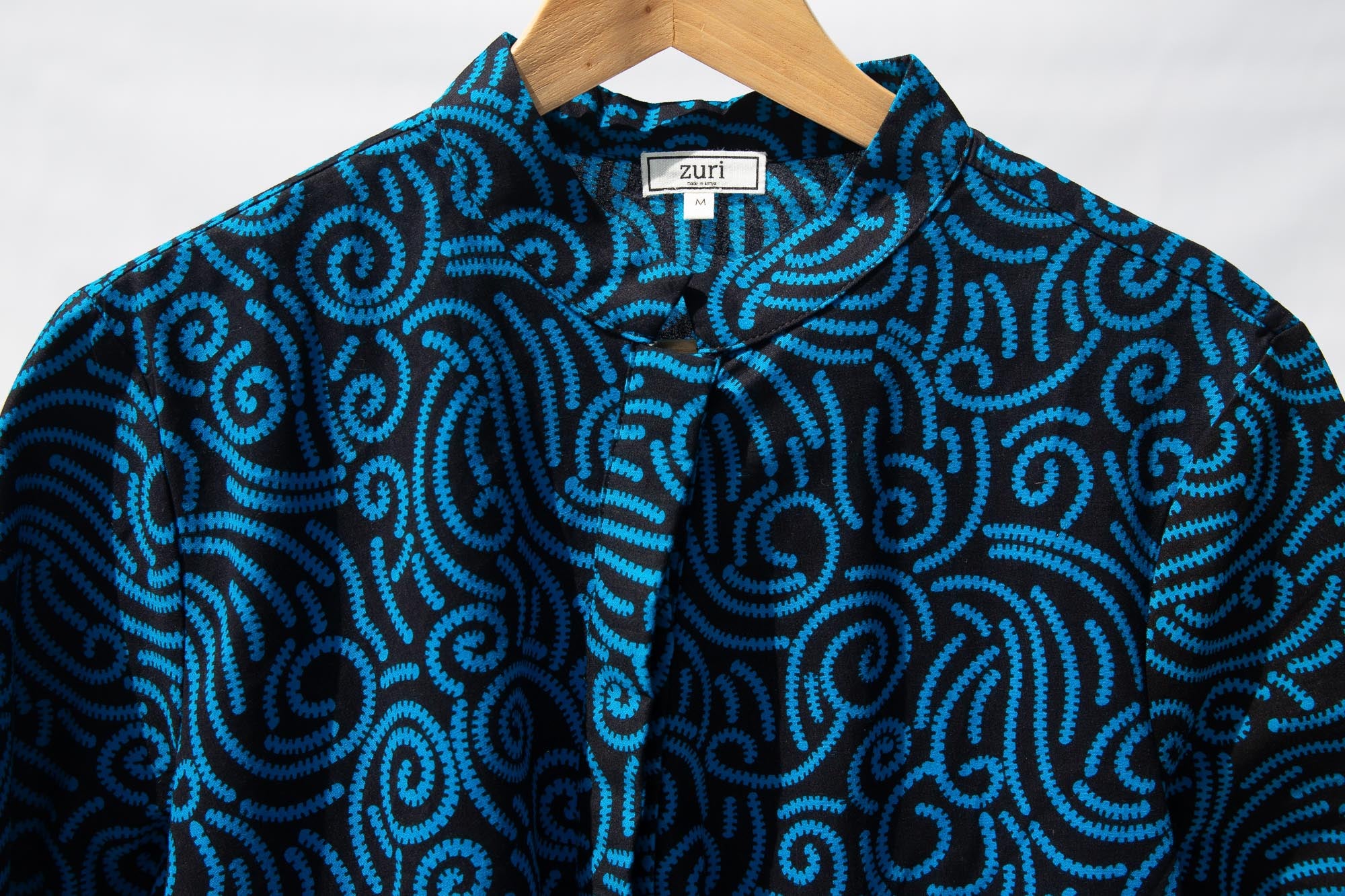 Display of blue and black print dress