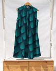 Display of black, blue and aqua print dress