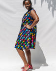 The model is wearing black dress with colorful panel