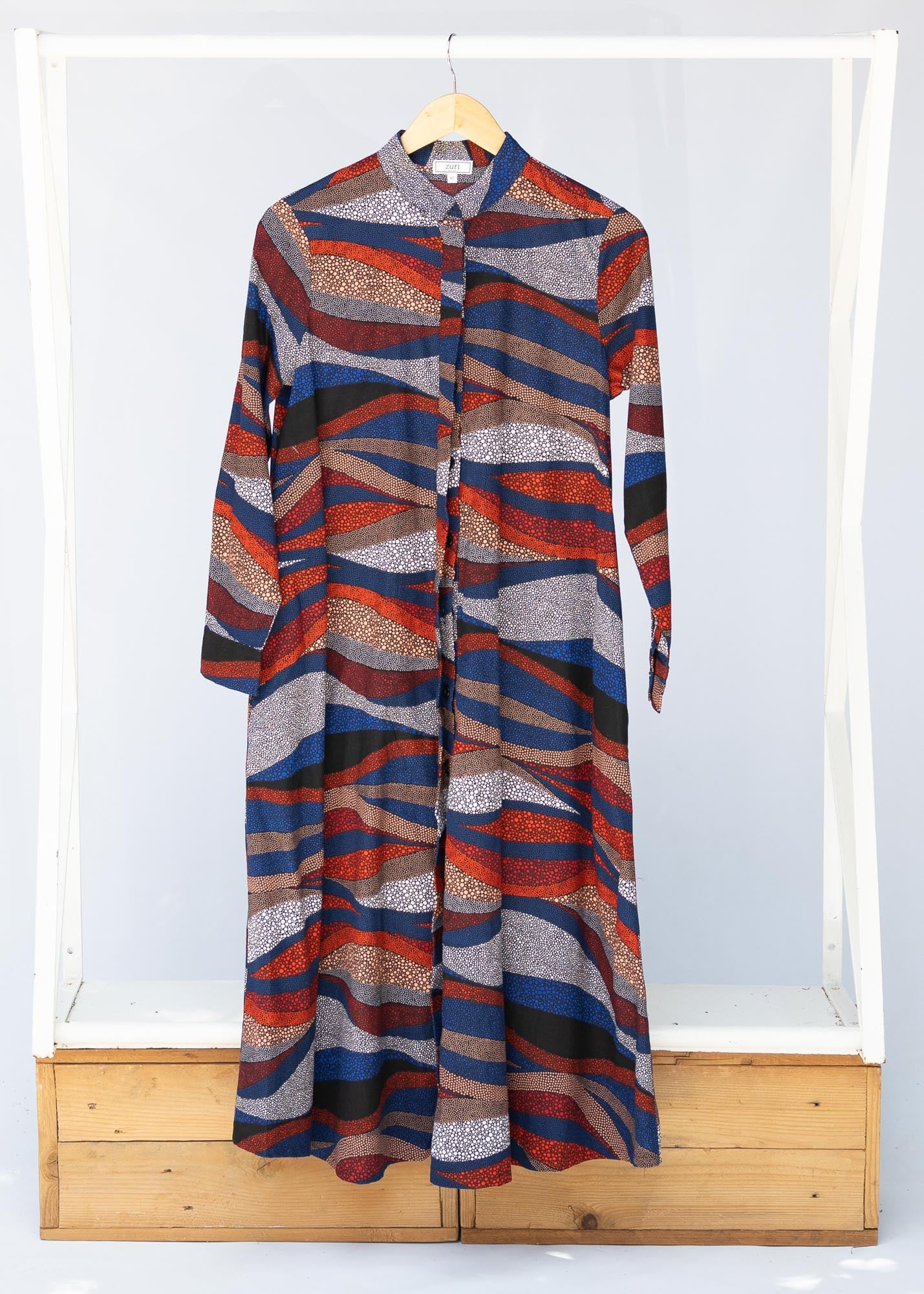 midi - length print dress on rack