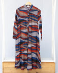 midi - length print dress on rack