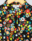 detail of a multicolor print dress