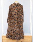 a midi-length paisley dress