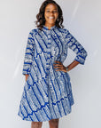 model wearing blue and white hand-blocked batik dress