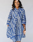 model wearing blue and white hand-blocked batik dress