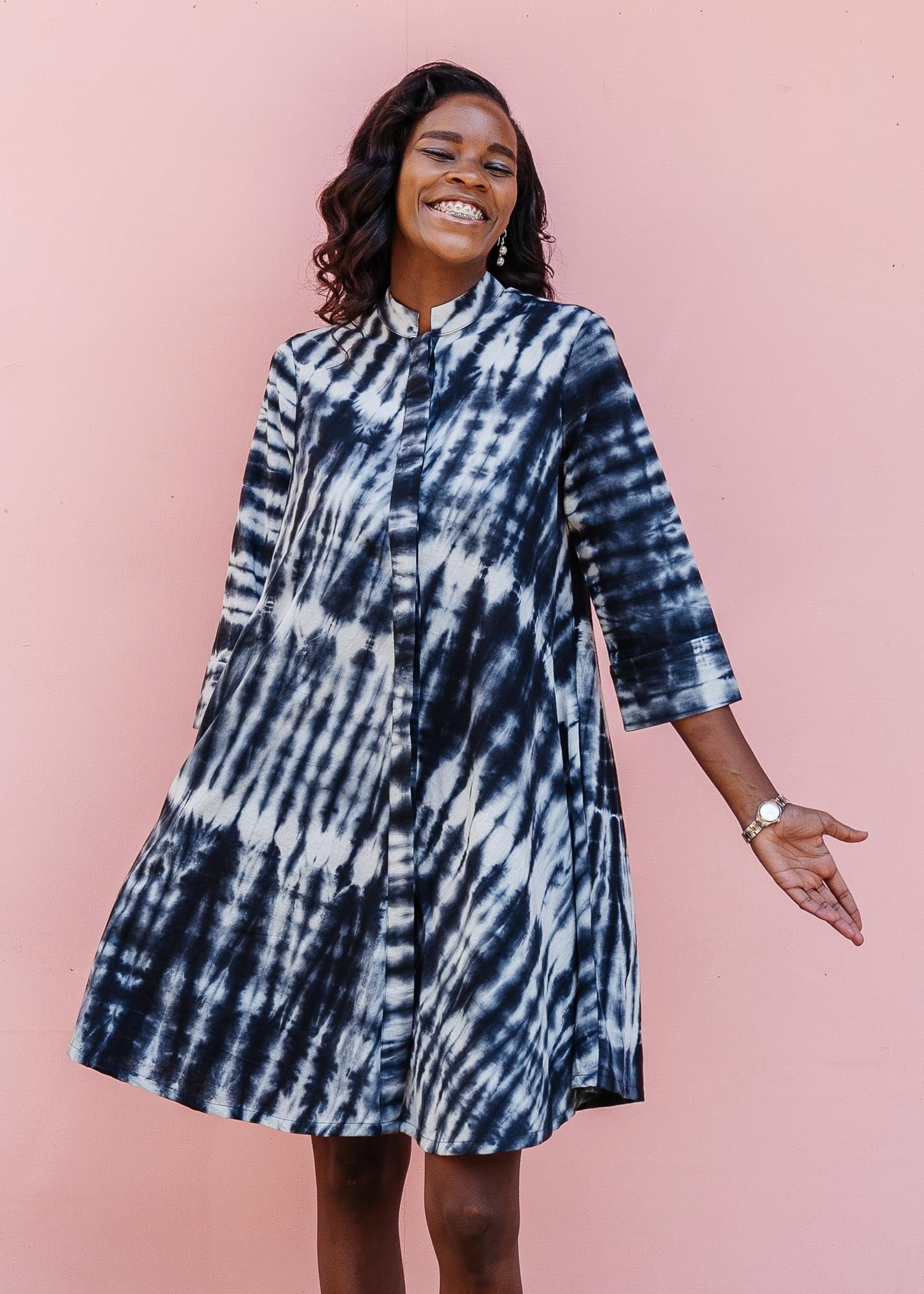 model wearing slate grey and white tie-dye dress