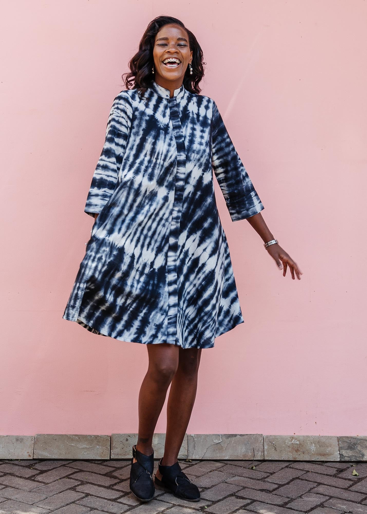 model wearing slate grey and white tie-dye dress