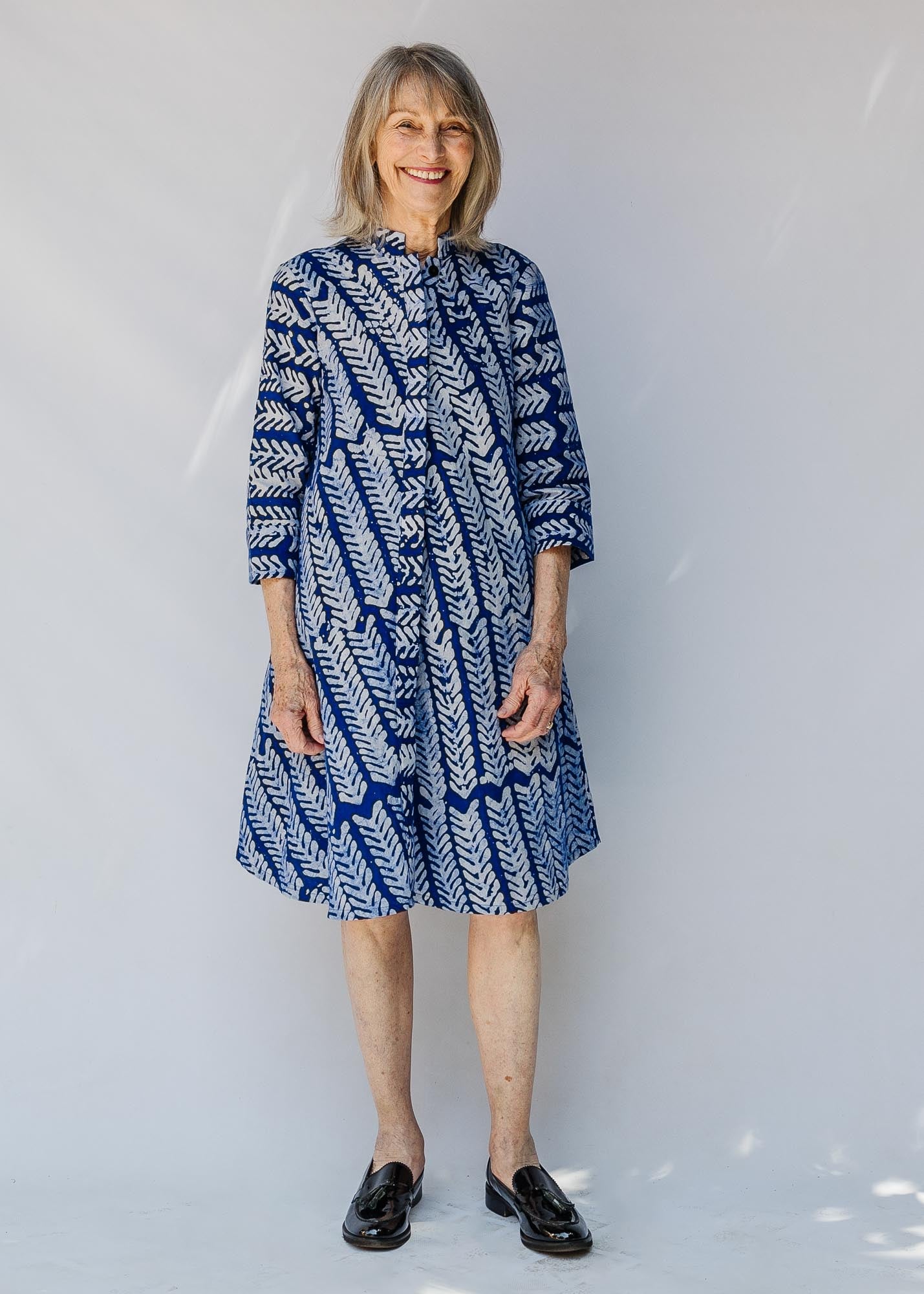 model wearing blue and white hand-blocked batik dress