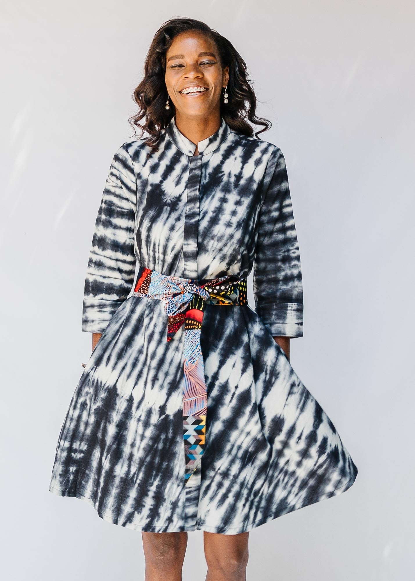 model wearing slate grey and white tie-dye dress