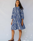 model wearing blue and white hand-blocked batik dress