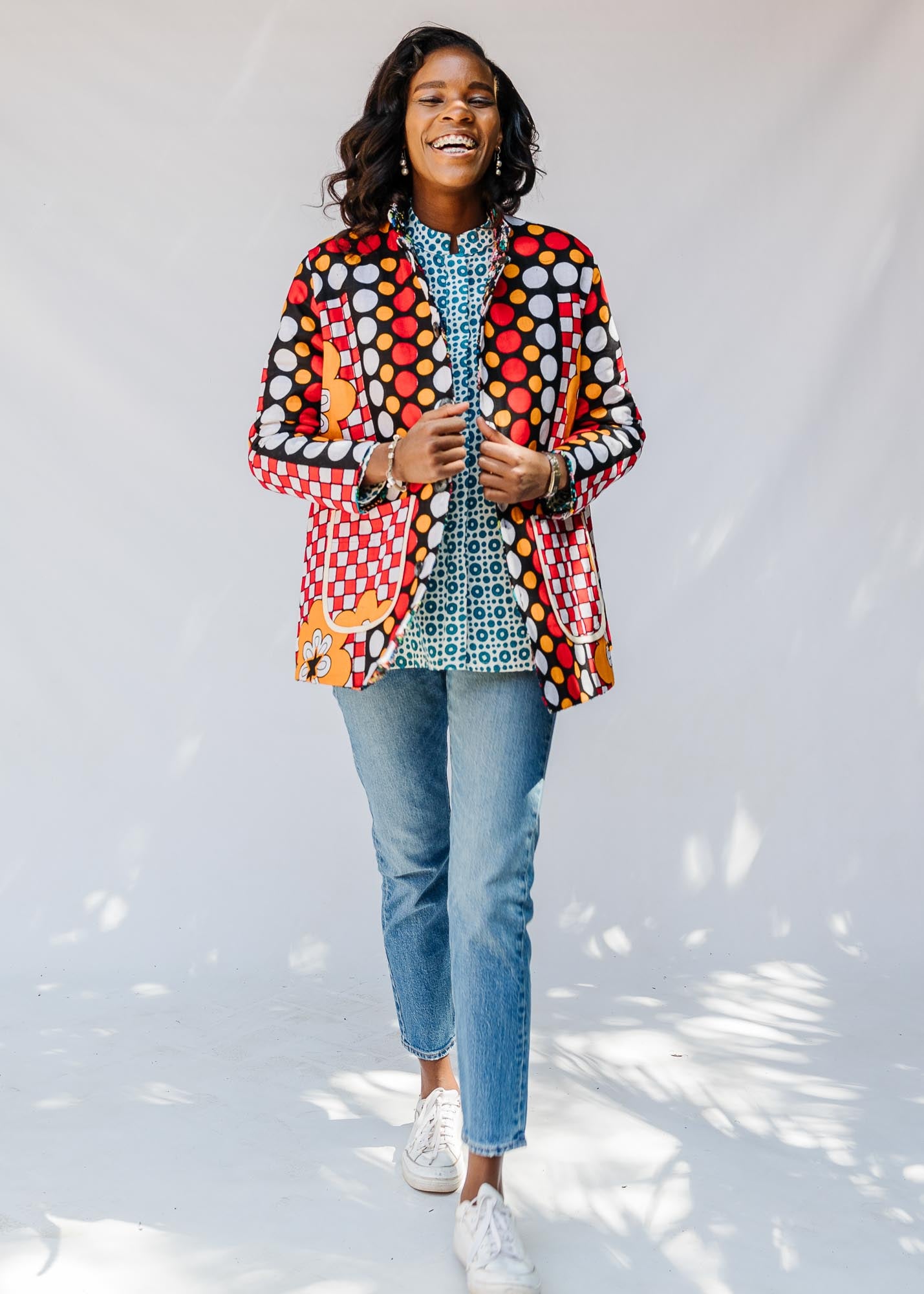 Model wearing quilted multicolor jacket