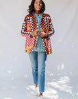 Model wearing quilted multicolor jacket