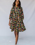 model wearing a multicolor print dress