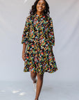 model wearing a multicolor print dress