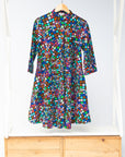 Display of multi colored dress with disco ball print