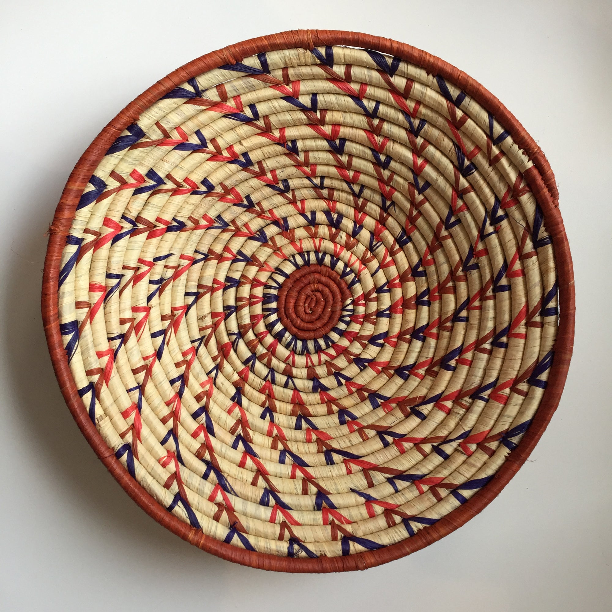 Orange and blue swirl woven bowls