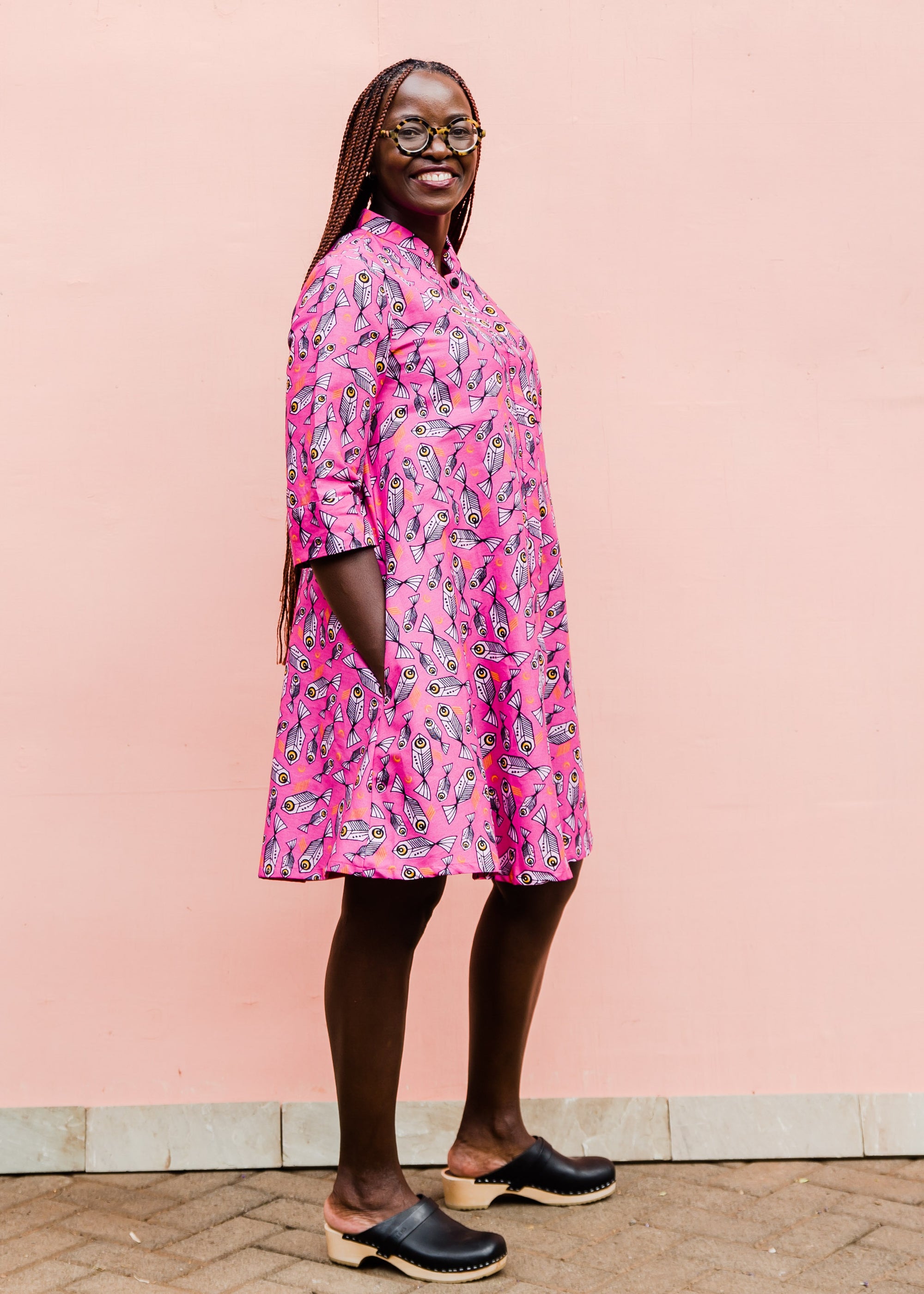 Purple fish on pink background dress